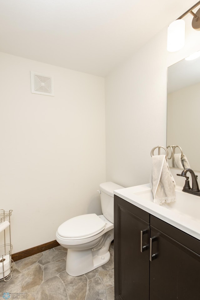 25 Birch Ln S, Fargo, ND 58103 - half bath featuring vanity and toilet