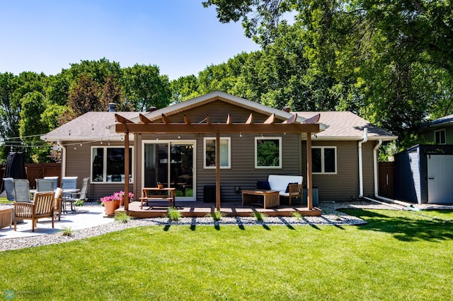 25 Birch Ln S, Fargo, ND 58103 - back of property featuring a storage shed, an outdoor hangout area, a wooden deck, a patio, and a shingled roof
