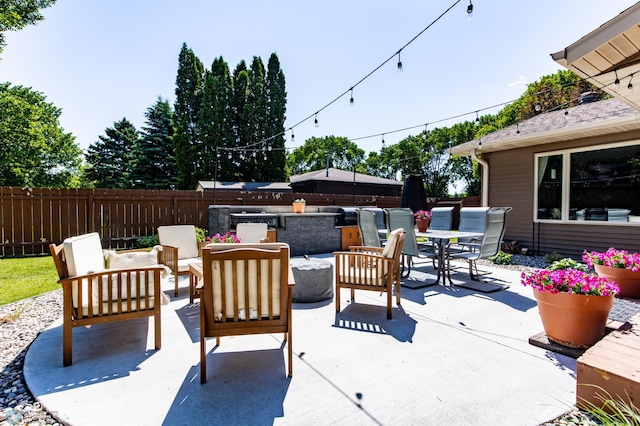 25 Birch Ln S, Fargo, ND 58103 - view of patio featuring outdoor dining space and an outdoor hangout area