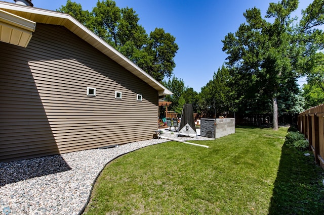25 Birch Ln S, Fargo, ND 58103 - fenced backyard featuring a patio area