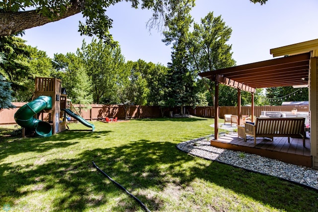 25 Birch Ln S, Fargo, ND 58103 - fenced backyard featuring a playground and a deck