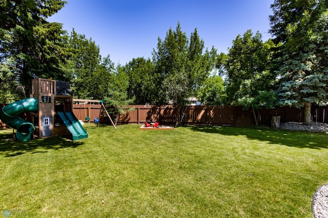 25 Birch Ln S, Fargo, ND 58103 - fenced backyard with a playground