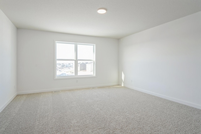 8362 Lander Ave NE, Otsego, MN 55330 - spare room with light carpet and baseboards