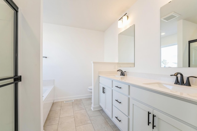 8362 Lander Ave NE, Otsego, MN 55330 - bathroom featuring double vanity, a garden tub, and tile patterned floors