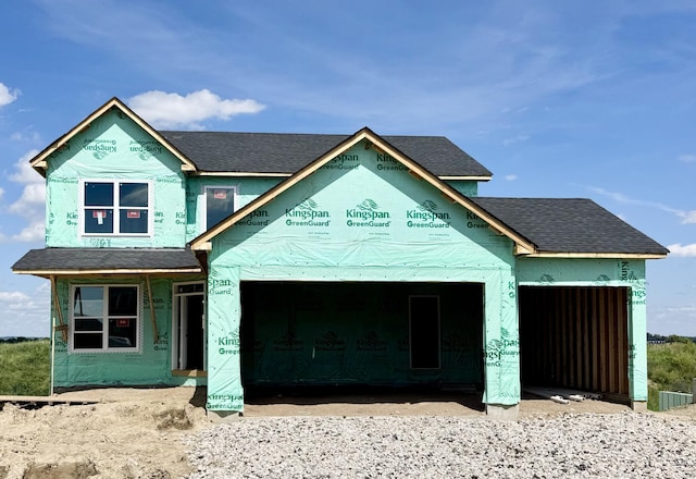 8362 Lander Ave NE, Otsego, MN 55330 - unfinished property with an attached garage and a shingled roof