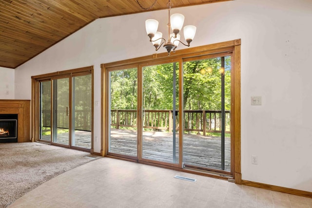 13384 Barnett Rd SW, Sylvan Twp, MN 56473 - unfurnished living room featuring wood ceiling, lofted ceiling, a chandelier, and a lit fireplace