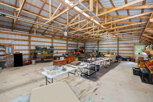 13384 Barnett Rd SW, Sylvan Twp, MN 56473 - garage with metal wall and a workshop area