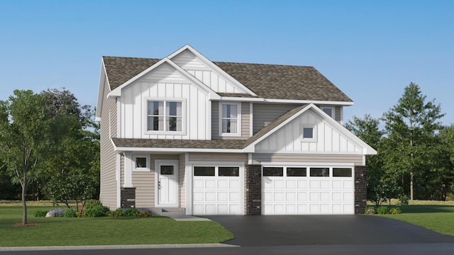7593 Norway Ln, Lino Lakes, MN 55038 - view of front of home featuring board and batten siding, a shingled roof, asphalt driveway, and a front yard