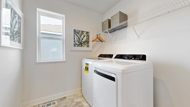 7593 Norway Ln, Lino Lakes, MN 55038 - washroom featuring washer and clothes dryer and plenty of natural light