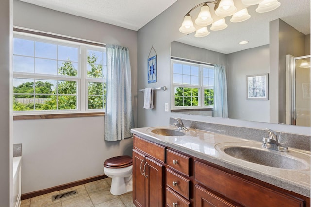 5214 Scott Ct, Robbinsdale, MN 55422 - bathroom featuring double vanity, a bath, an enclosed shower, tile patterned floors, and a chandelier