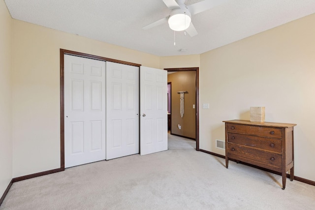 5214 Scott Ct, Robbinsdale, MN 55422 - bedroom with light colored carpet, a closet, and ceiling fan