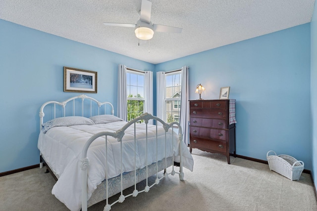 5214 Scott Ct, Robbinsdale, MN 55422 - bedroom with carpet, a textured ceiling, and a ceiling fan