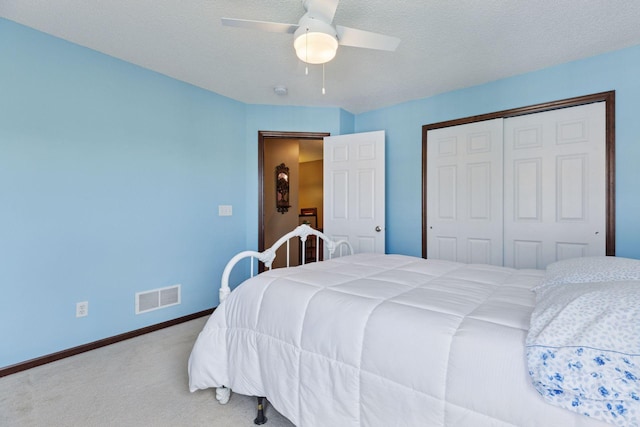 5214 Scott Ct, Robbinsdale, MN 55422 - carpeted bedroom featuring a closet and ceiling fan