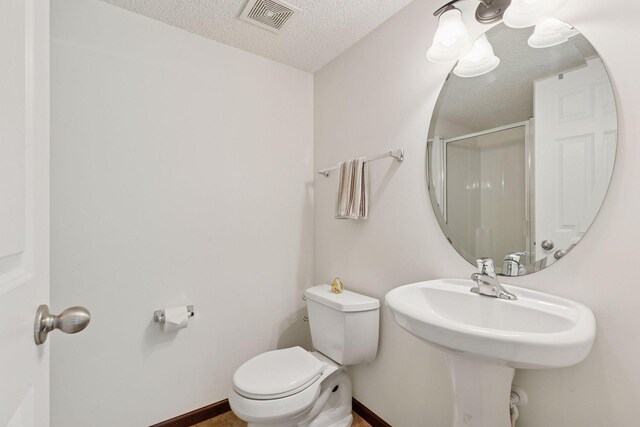 5214 Scott Ct, Robbinsdale, MN 55422 - full bath with a textured ceiling and a shower with door