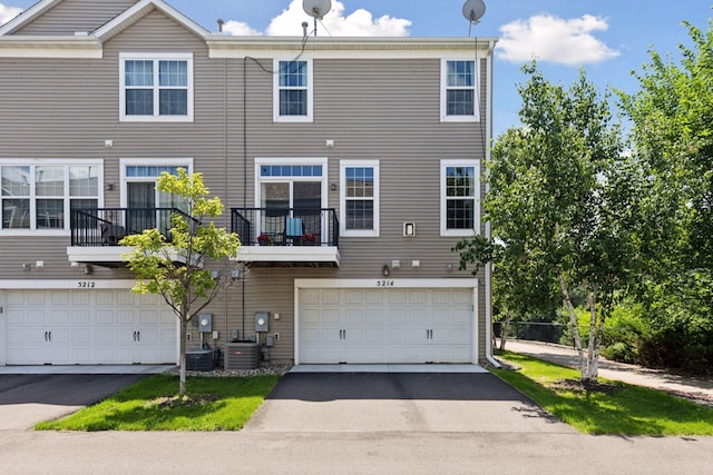 5214 Scott Ct, Robbinsdale, MN 55422 - view of front of home featuring an attached garage and asphalt driveway