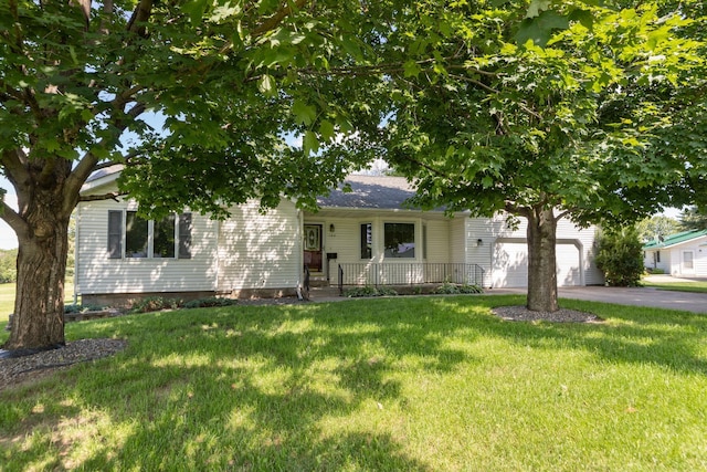 104 County Rd N, Le Roy, MN 55951 - obstructed view of property featuring covered porch, driveway, a front lawn, and an attached garage