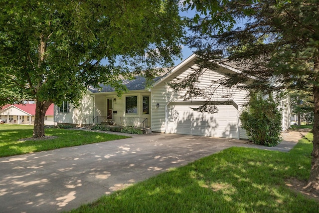 104 County Rd N, Le Roy, MN 55951 - single story home with concrete driveway, an attached garage, and a front yard