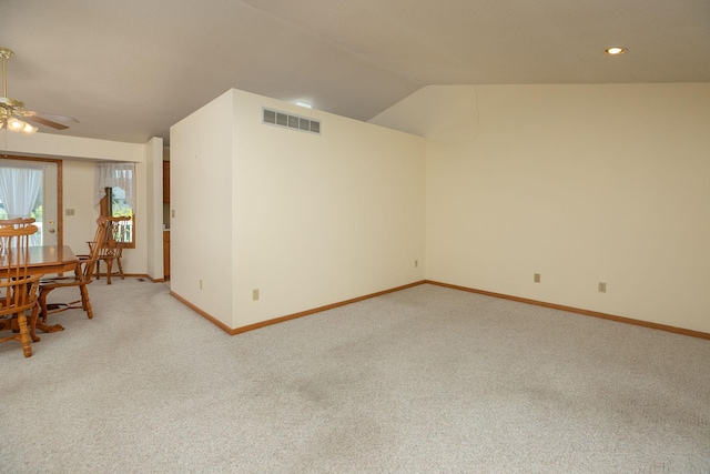 104 County Rd N, Le Roy, MN 55951 - empty room featuring ceiling fan, light colored carpet, lofted ceiling, and recessed lighting