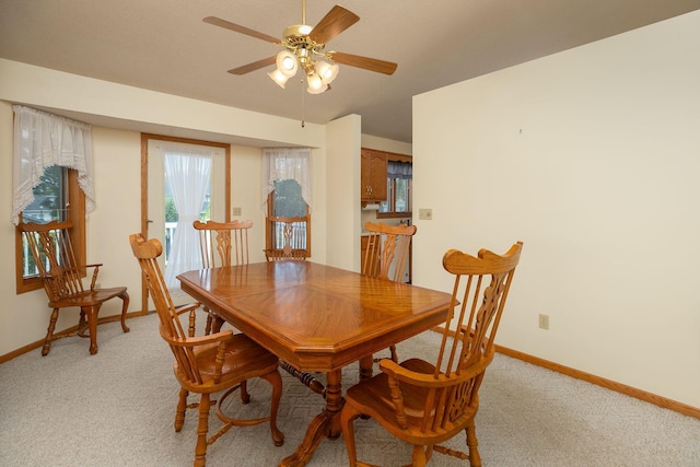 104 County Rd N, Le Roy, MN 55951 - dining room featuring light carpet and a ceiling fan