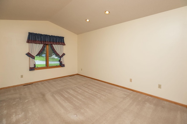 104 County Rd N, Le Roy, MN 55951 - empty room featuring light colored carpet, vaulted ceiling, and recessed lighting