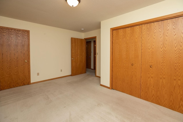 104 County Rd N, Le Roy, MN 55951 - unfurnished bedroom featuring carpet and a closet