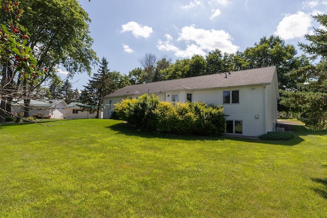 104 County Rd N, Le Roy, MN 55951 - back of property with a lawn