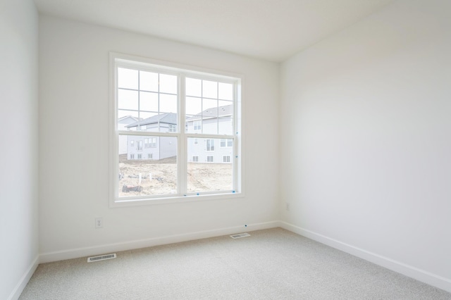 6722 Tamarack Ln, Corcoran, MN 55340 - carpeted empty room with healthy amount of natural light