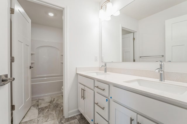 6722 Tamarack Ln, Corcoran, MN 55340 - bathroom with double vanity, marble finish floors, recessed lighting, and shower / bath combination