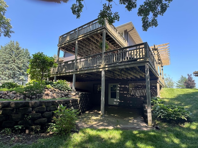 715 250th Ave, Fairmont, MN 56031 - back of property with a deck and a patio