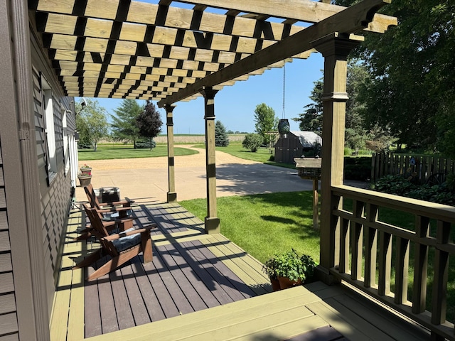 715 250th Ave, Fairmont, MN 56031 - deck featuring a storage shed, a pergola, and a yard