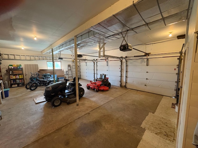 715 250th Ave, Fairmont, MN 56031 - garage featuring a garage door opener