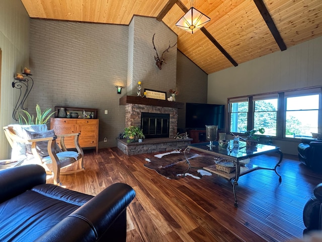 715 250th Ave, Fairmont, MN 56031 - living room with high vaulted ceiling, a wooden ceiling with exposed beams, wood finished floors, a stone fireplace, and brick wall