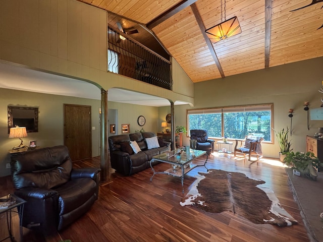 715 250th Ave, Fairmont, MN 56031 - living room with ornate columns, high vaulted ceiling, hardwood / wood-style floors, arched walkways, and wooden ceiling