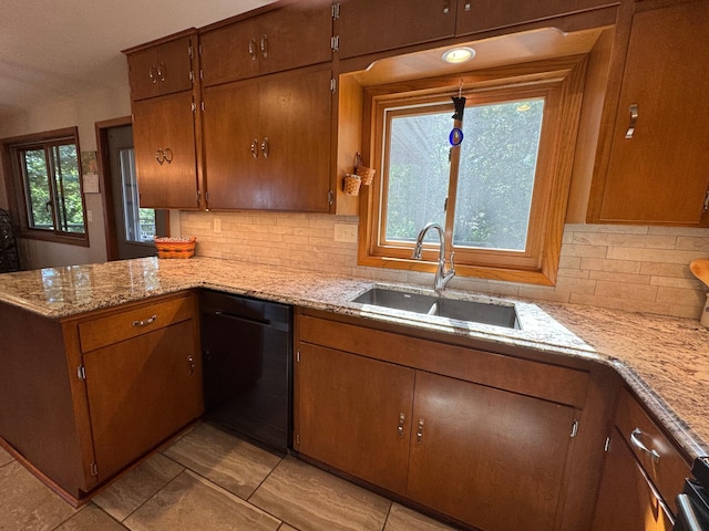 715 250th Ave, Fairmont, MN 56031 - kitchen with dishwasher, tasteful backsplash, a peninsula, and light tile patterned floors