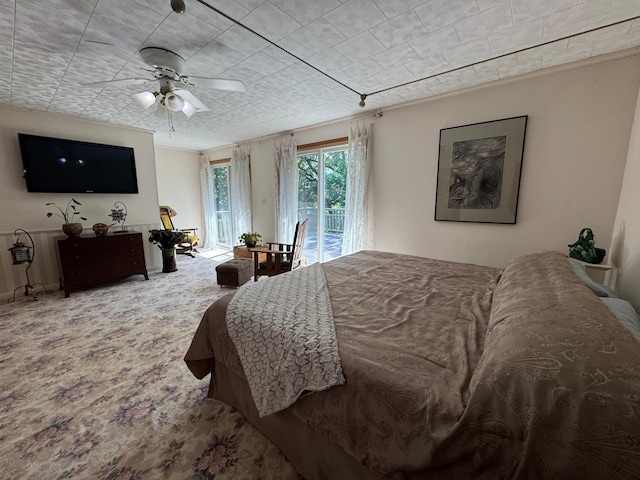 715 250th Ave, Fairmont, MN 56031 - bedroom featuring access to exterior, carpet floors, and a ceiling fan