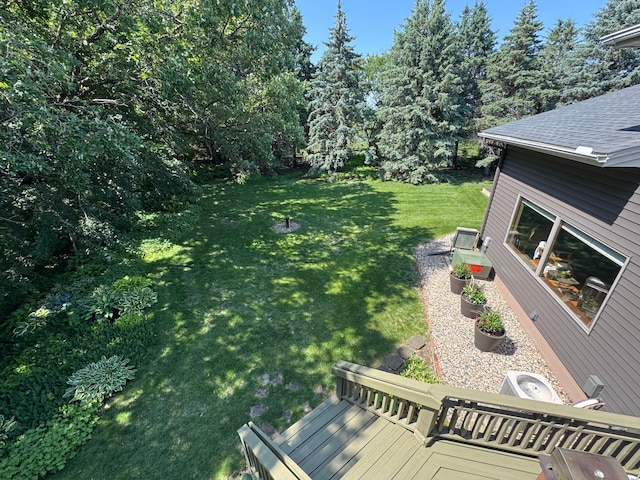 715 250th Ave, Fairmont, MN 56031 - view of green lawn with a deck