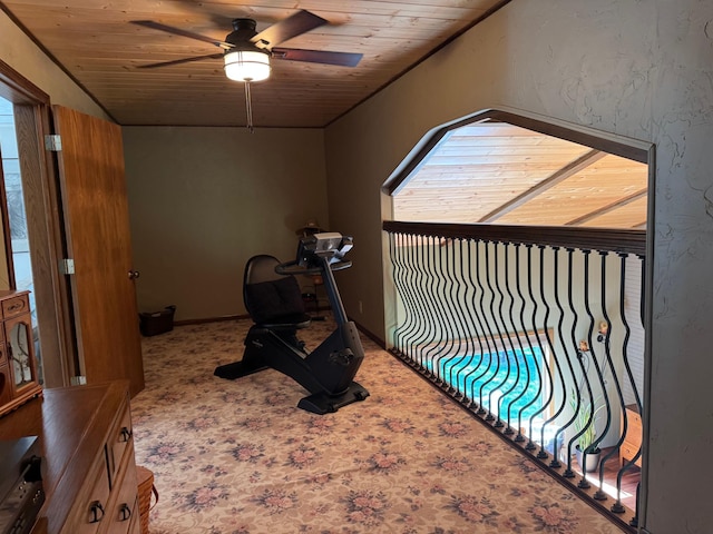715 250th Ave, Fairmont, MN 56031 - unfurnished bedroom with wooden ceiling, carpet flooring, and a ceiling fan