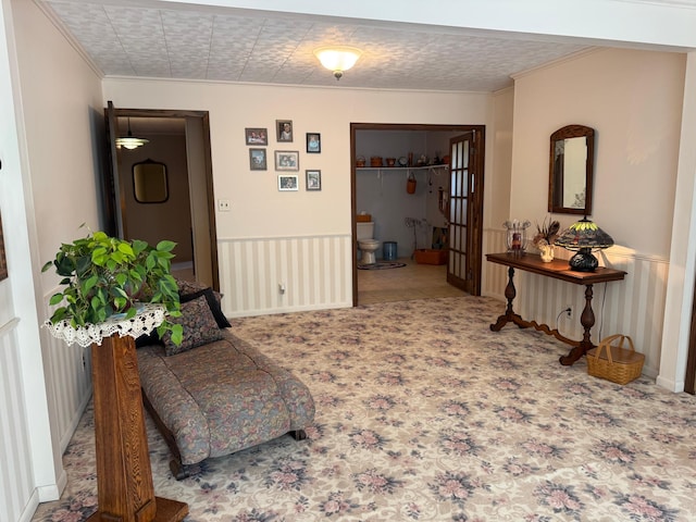 715 250th Ave, Fairmont, MN 56031 - sitting room featuring carpet floors and ornamental molding