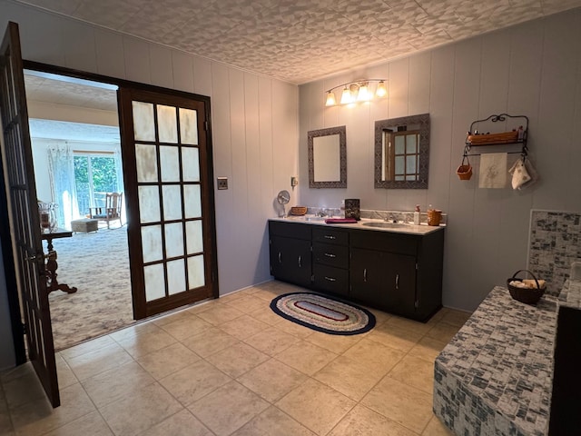 715 250th Ave, Fairmont, MN 56031 - full bathroom featuring double vanity and tile patterned flooring