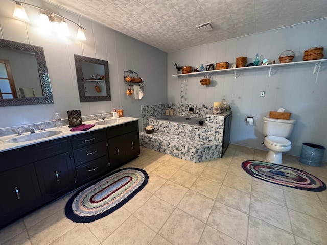 715 250th Ave, Fairmont, MN 56031 - bathroom with a bath, double vanity, and tile patterned floors