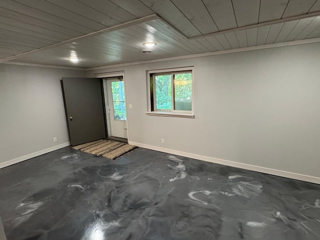 715 250th Ave, Fairmont, MN 56031 - spare room featuring crown molding, concrete floors, and wooden ceiling
