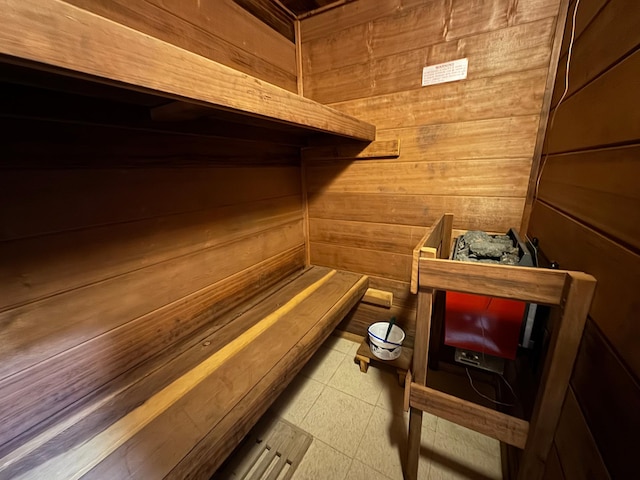 715 250th Ave, Fairmont, MN 56031 - relaxing sauna / steam room featuring wood walls and tile patterned floors