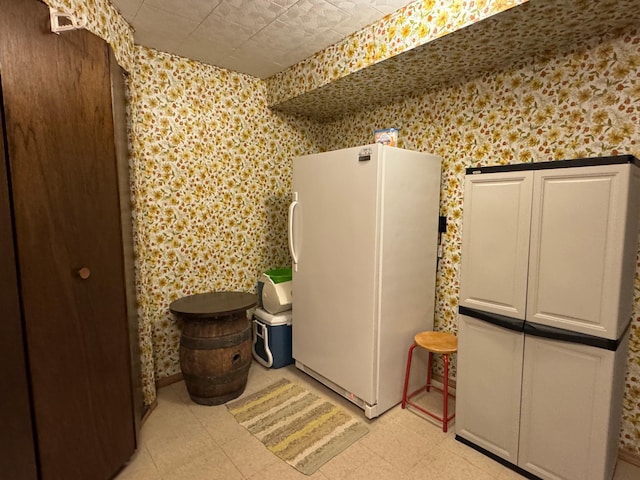 715 250th Ave, Fairmont, MN 56031 - interior space with wallpapered walls and light floors