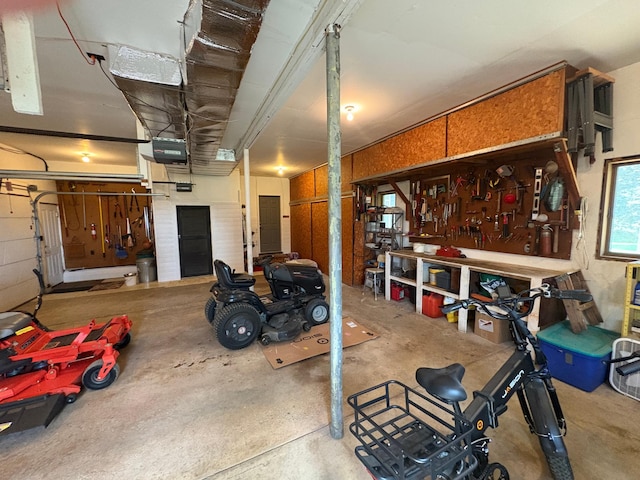 715 250th Ave, Fairmont, MN 56031 - garage featuring a workshop area