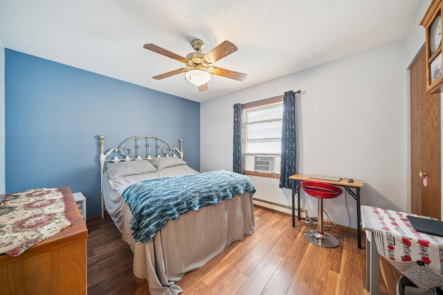2227 3rd St SW, Rochester, MN 55902 - bedroom with cooling unit, light wood finished floors, a textured ceiling, baseboard heating, and ceiling fan