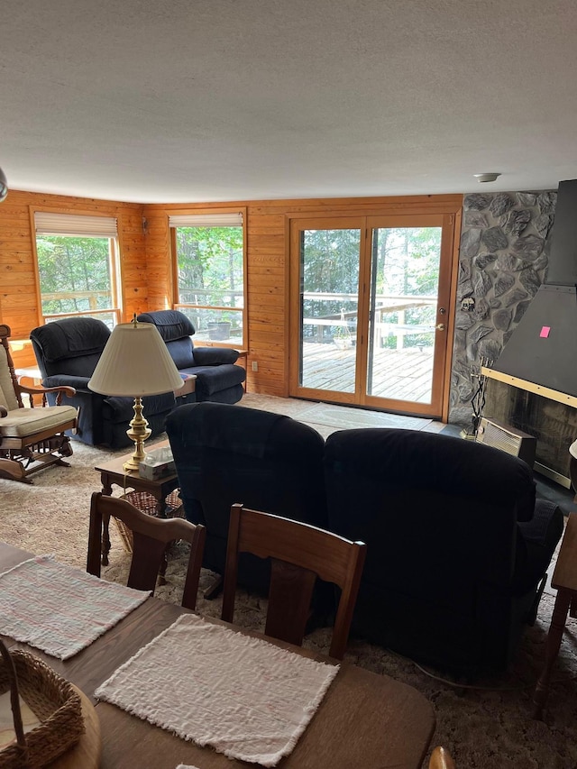 2485 Keyes Is, International Falls, MN 56649 - living room with wooden walls and a textured ceiling
