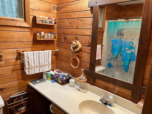 2485 Keyes Is, International Falls, MN 56649 - full bathroom with wood walls, curtained shower, and vanity