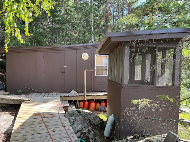 2485 Keyes Is, International Falls, MN 56649 - wooden terrace featuring a storage shed