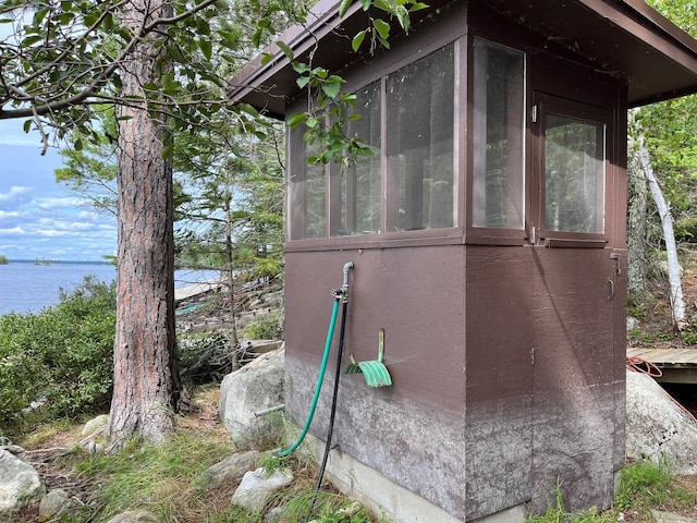 2485 Keyes Is, International Falls, MN 56649 - view of outbuilding with a water view and a sunroom