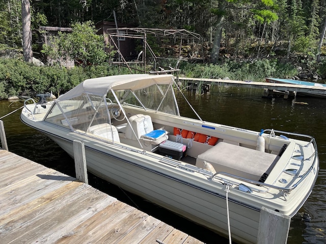 2485 Keyes Is, International Falls, MN 56649 - dock area featuring a water view and view of wooded area